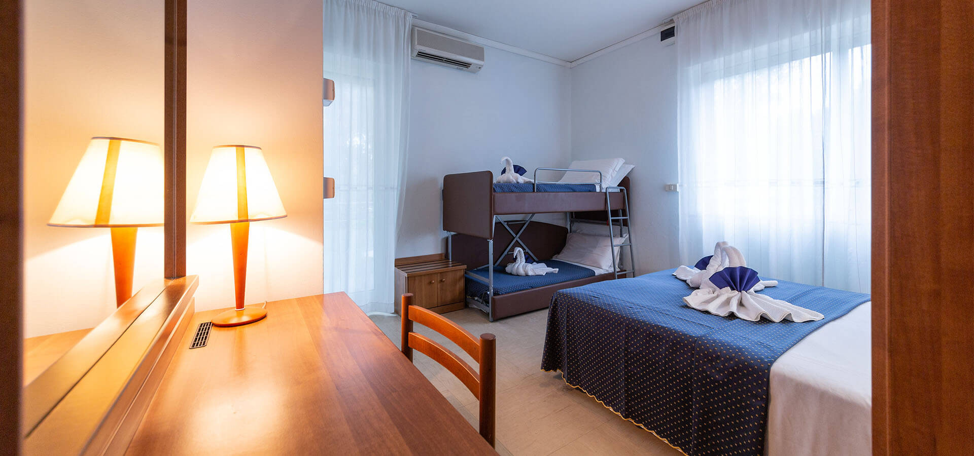 Camera quadrupla per famiglie hotel a Lignano Sabbiadoro